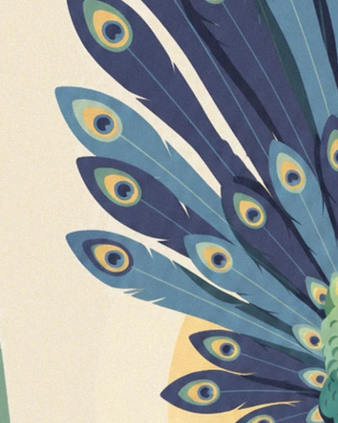 The blue and turquoise feathers fanned out in front of part of the golden sun