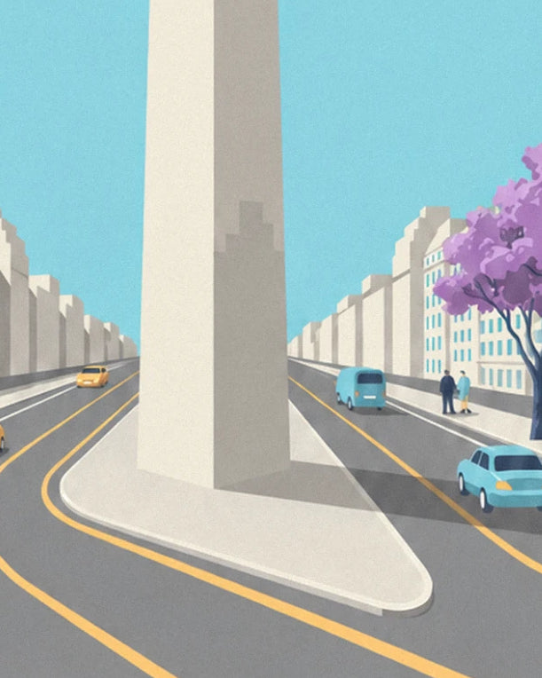 Der Obelisk auf seiner Verkehrsinsel zwischen gelben Taxis und einem blühenden Jacaranda