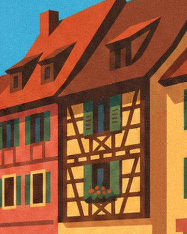 Ein gelbes Haus mit braunem Fachwerk, grünen Fensterläden und einem blumengefüllten Blumenkasten