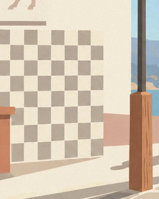 Le mur en damier gris et crème, un poteau en bois brun et la mer au fond