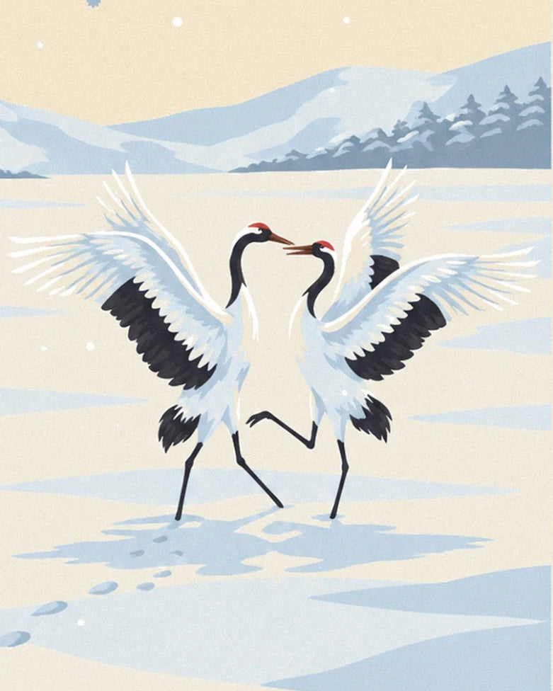 The 2 white cranes facing each other, wings spread in the snow