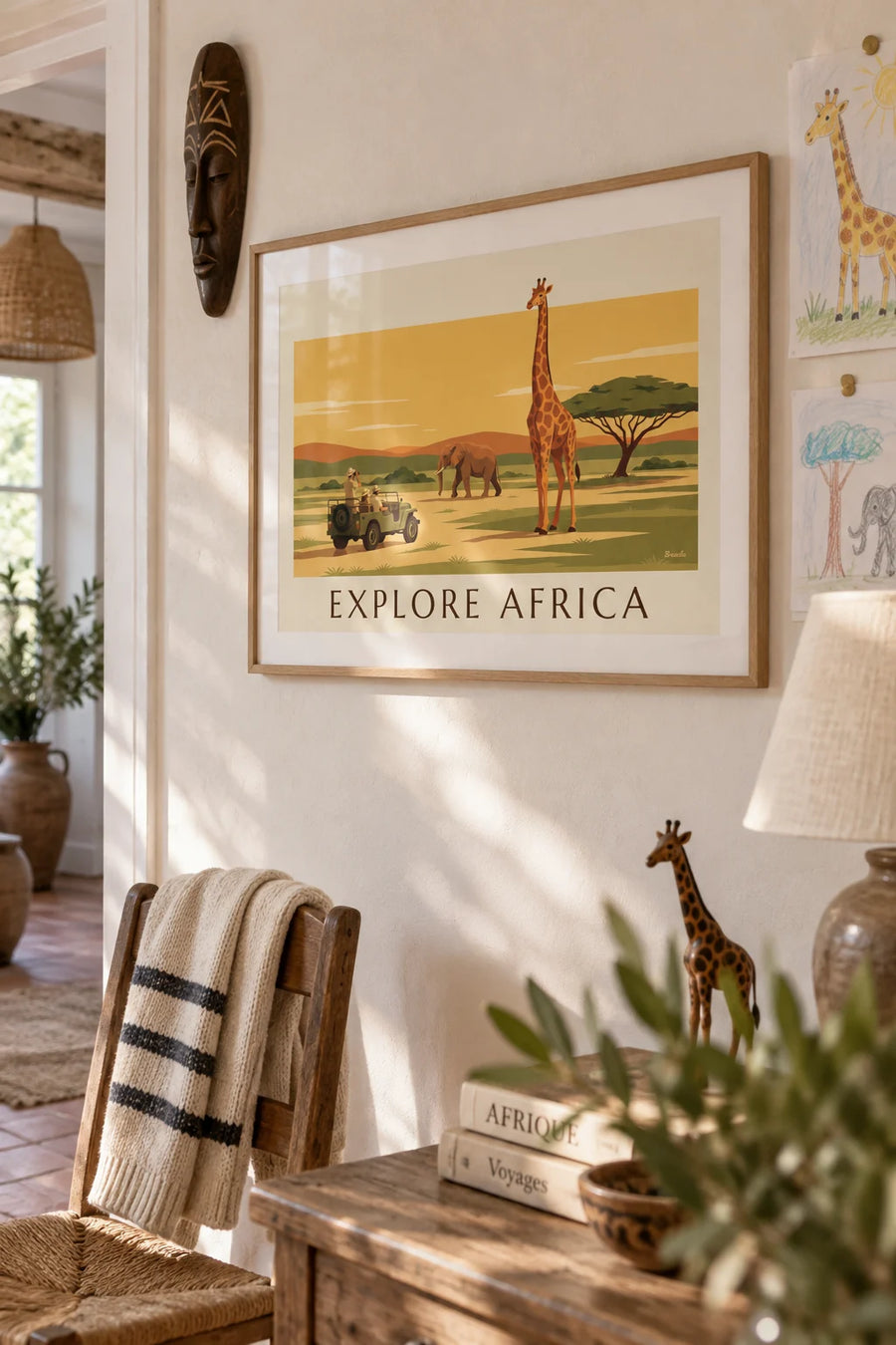 Poster of an African safari with elephant, giraffe and acacia: framed on the wall