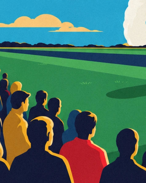 The spectators seen from behind, in a yellow jacket and red jumper, watching the display from the grass