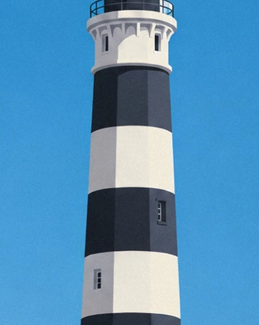 The tower of the Créac'h lighthouse, striped black and white against the blue sky