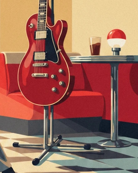 The red guitar on its stand in front of a red booth and a diner table