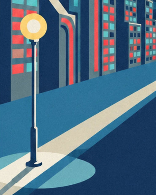 The yellow globe street lamp lighting the road opposite the red and turquoise windows
