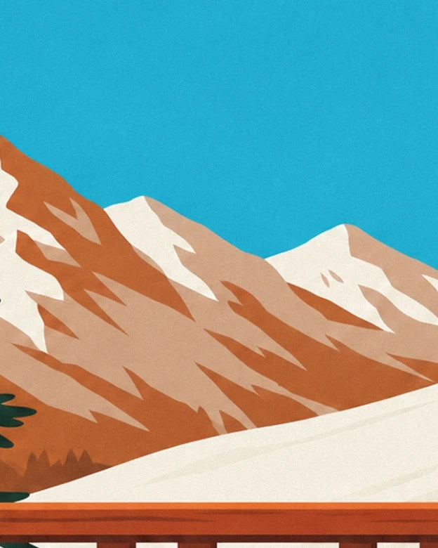 The snowy peaks beneath the blue sky behind the wooden terrace railing