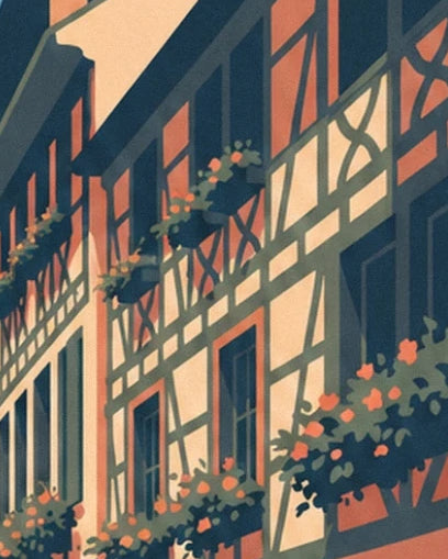 Das Fachwerk an den creme- und korallfarbenen Fassaden, geschmückt mit blumengefüllten Blumenkästen