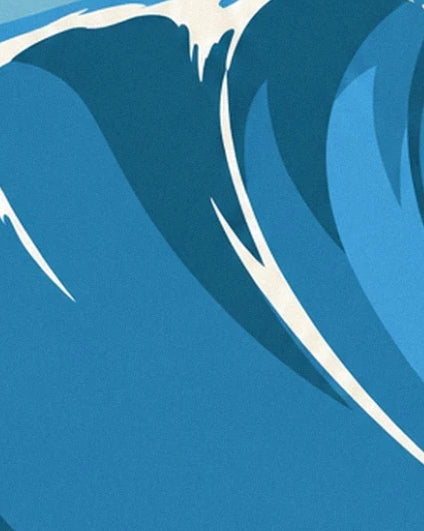 La courbe vertigineuse de la vague bleue et ses longues traînées d’écume blanche