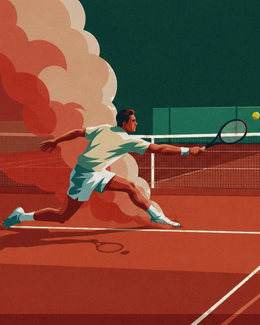 The player in white sliding across the clay with a racket reaching towards the ball