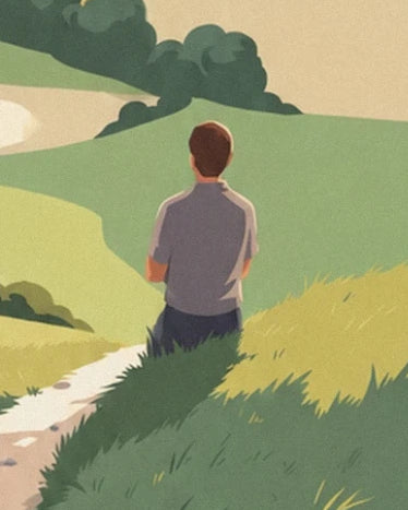 Un homme de dos en chemise grise, près du sentier bordé de hautes herbes