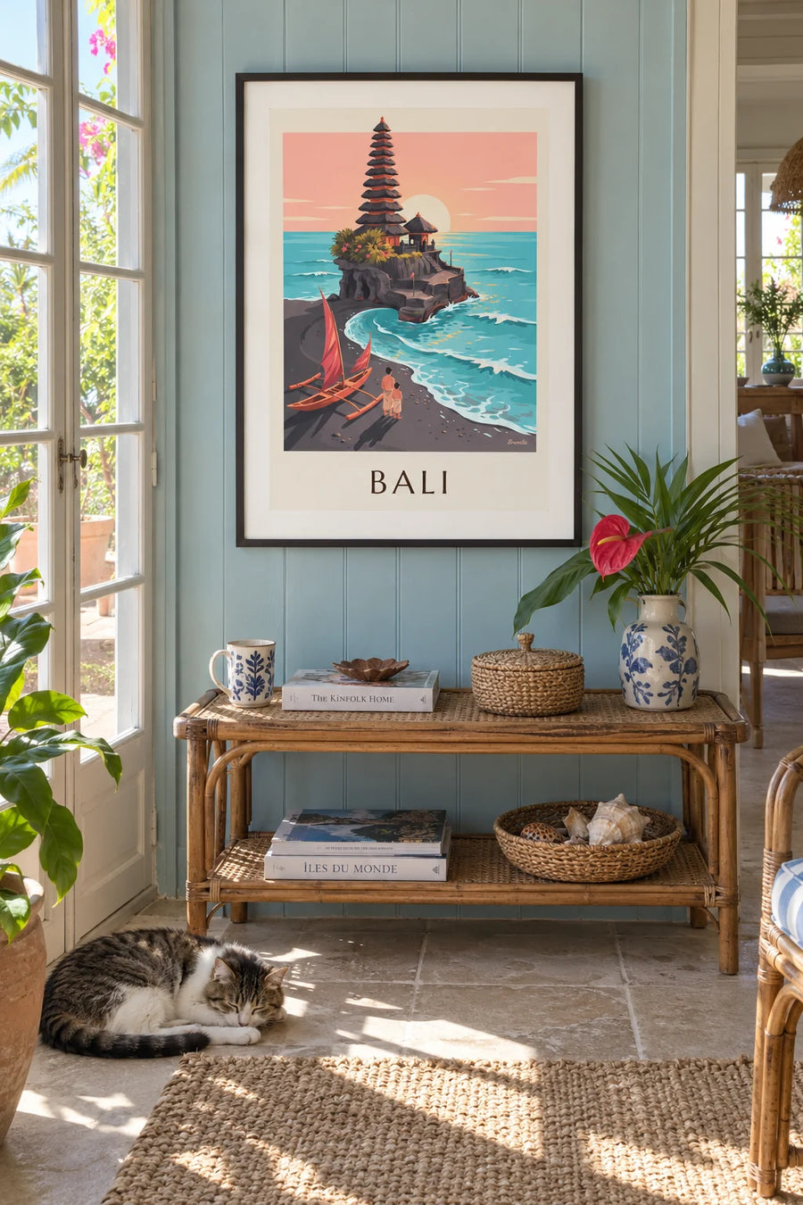 Poster of the Tanah Lot temple and an outrigger canoe in Bali: framed on the wall