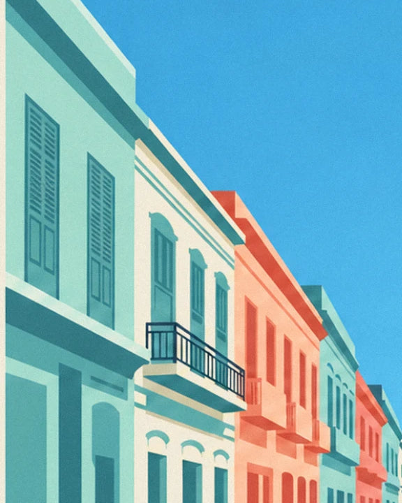 Turquoise and coral façades with green shutters and a wrought iron balcony