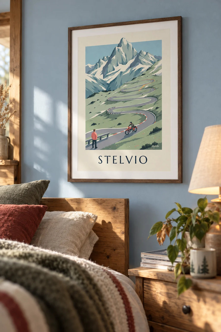 Poster of a motorcyclist on the switchbacks of the Stelvio Pass in Italy: framed on the wall