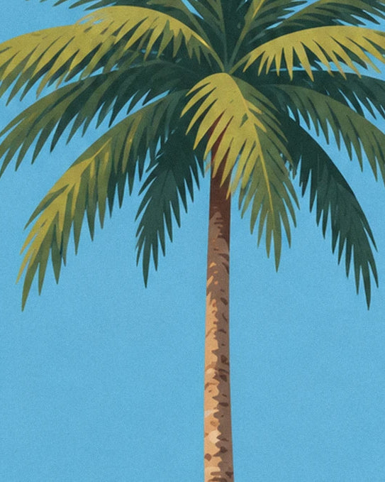 Die langen grün-goldenen Palmwedel vor dem blauen Himmel Martiniques