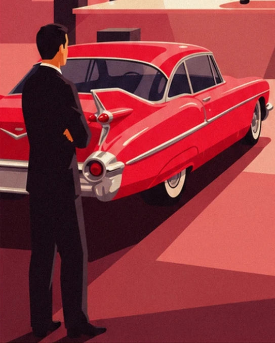 Un homme en costume noir devant une voiture rouge aux ailerons chromés