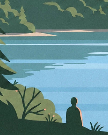 A figure by the blue water, framed by branches and green foliage